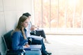 Young woman waiting for a job interview seriously