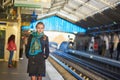 Young woman waiting for a train on the platform of Parisian underground Royalty Free Stock Photo