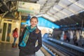 Young woman waiting for a train on the platform of Parisian underground Royalty Free Stock Photo