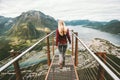 Young woman walking alone on Rampestreken viewpoint