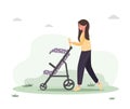 Young woman walking with her newborn child in an pram. Girl sitting with a stroller and a baby in park in the open air