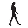 Young woman walking in high heels shoes, isolated vector silhou Royalty Free Stock Photo