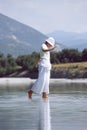 Young woman walking in lake Royalty Free Stock Photo