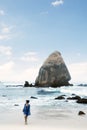 Young woman walking on the Papuma beach Royalty Free Stock Photo