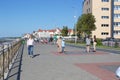 Young Woman walking on the Promenade with daughter Sunny windy Summer day Royalty Free Stock Photo