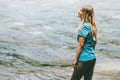 Young woman walking at river alone Lifestyle travel Royalty Free Stock Photo