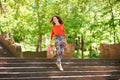 Young woman walking with shopping bags Royalty Free Stock Photo