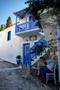 Young Woman Walking Sightseeing in a Small Greek Town of Chora in Greece in the Summer, Alonissos Island Part of the North Sporade Royalty Free Stock Photo