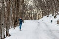 Young woman walking in snow
