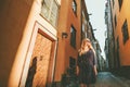 Young woman walking in Stockholm city excursion Royalty Free Stock Photo