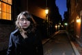 Young Woman Walking the Streets at Night Royalty Free Stock Photo