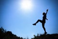 Young woman walking in the sun