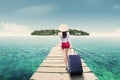 Young woman walking toward island Royalty Free Stock Photo