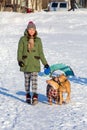 Young woman walking with two American Pit Bull Terrier winter Royalty Free Stock Photo