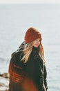 Young Woman walking at winter seaside Travel Fashion Lifestyle concept outdoor Royalty Free Stock Photo