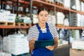 Young woman warehouse worker checking documents Royalty Free Stock Photo