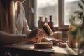 Young woman washes dishes with wooden brush, concept of Natural living, created with Generative AI technology