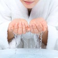 Young woman washing face Royalty Free Stock Photo