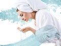 Young woman washing face with clean water. Royalty Free Stock Photo