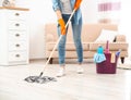 Young woman washing floor with mop in living room, closeup. Cleaning Royalty Free Stock Photo