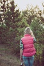 Young woman watching landscape, posing outdoor.