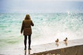 Young woman watching storm over lake Royalty Free Stock Photo