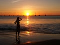 Young woman watching sunset Royalty Free Stock Photo