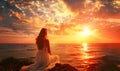 Young Woman Watching Sunset in a Beach in a Romantic Style Royalty Free Stock Photo