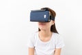 Young woman watching though the VR device