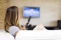 Young woman watching TV Royalty Free Stock Photo