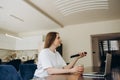 Young woman watching TV in the room Royalty Free Stock Photo