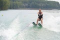 Young woman water skiing on lake Royalty Free Stock Photo