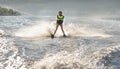 A young woman water skiing. Royalty Free Stock Photo