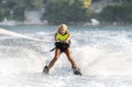 A young woman water skiing. Royalty Free Stock Photo