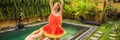 Young woman in a watermelon dress on a pool background. The concept of summer, diet and healthy eating BANNER, LONG Royalty Free Stock Photo