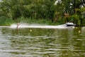 Young woman waterskiing