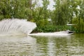 Young woman waterskiing