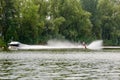 Young woman waterskiing