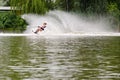 Young woman waterskiing