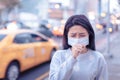 Young  woman wear mask in the city during Smog day Royalty Free Stock Photo