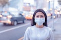 Young  woman wear mask in the city during Smog day Royalty Free Stock Photo
