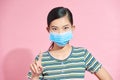 Young woman wear medical mask and showing no and stop sign gesture. keep away, Social distance Royalty Free Stock Photo