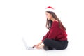 Young woman wear santa hat sitting labtop with internet shopping Royalty Free Stock Photo