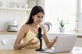 Woman talking into microphone lead on-line streaming Royalty Free Stock Photo