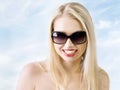 Young woman wearing the big modern sunglasses. Royalty Free Stock Photo