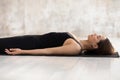 Woman practicing yoga, Savasana, Dead Body pose, Corpse close up Royalty Free Stock Photo