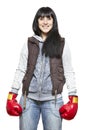 Young woman wearing boxing gloves smiling Royalty Free Stock Photo