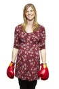 Young woman wearing boxing gloves smiling Royalty Free Stock Photo