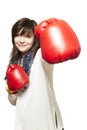 Young woman wearing boxing gloves smiling Royalty Free Stock Photo