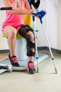 Young woman wearing a brace on her leg Royalty Free Stock Photo